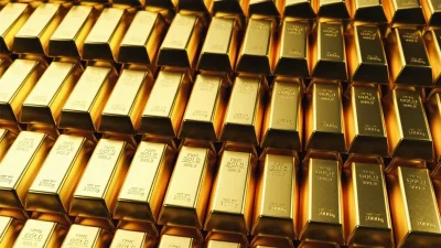 Hafta içinde 4.697 dolarla zirve yapan ons altın, Fed'in şahin